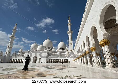 Stock Photo - Courtyard of the Sheikh Zayed Grand Mosque; Abu Dhabi, United Arab Emirates. Fotosearch