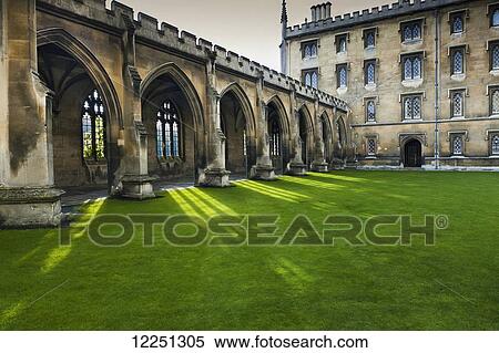 Stock Photography - Courtyard with lush green grass; Cambridge, England. Fotosearch