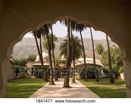 Courtyard With Palm Trees; Aravalli Hills Of Rajasthan, India View Large Photo Image Stock Photo - Courtyard With Palm Trees; Aravalli Hills Of Rajasthan, India. Fotosearch