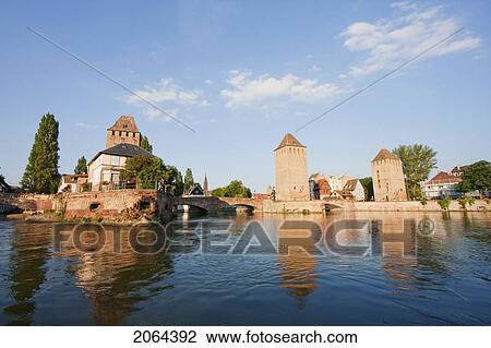 Stock Image - Covered Bridges With Medieval Watchtowers, Strasbourg, France. Fotosearch