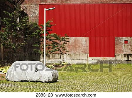 Covered car in abandoned industrial site; Montreal, Quebec, Canada View Large Photo Image Stock Image - Covered car in abandoned industrial site; Montreal, Quebec, Canada. Fotosearch