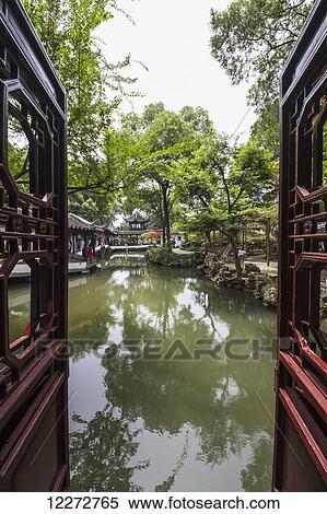 Stock Photography - Covered walkways, as seen from the Mandarin Duck Hall in the Humble Administrator's Garden, Suzhou, Jiangsu, China. Fotosearch