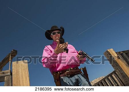 Cowboy Action Shoot At Lajitas Resort, Big Bend National Park And Big Bend State Park, South West Texas, Usa View Large Photo Image Stock Photography - Cowboy Action Shoot At Lajitas Resort, Big Bend National Park And Big Bend State Park, South West Texas, Usa. Fotosearch
