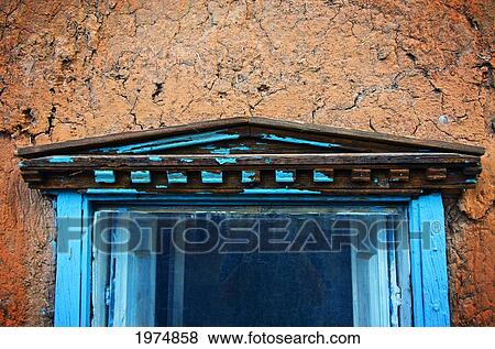 Stock Photo - Cracked Blue Paint, New Mexico, Details Of Cracked Adobe Wall And Painted Blue 19Th Century Window.. Fotosearch