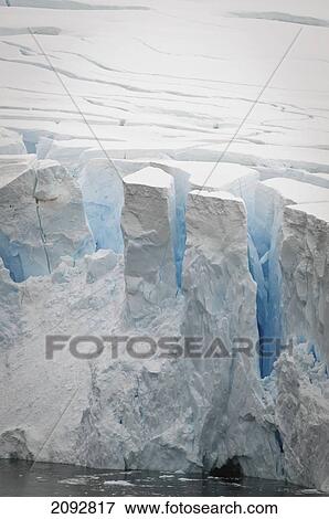 Stock Photo - Cracks On The Edge Of An Iceberg; Antarctica. Fotosearch