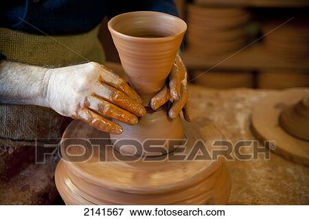 Stock Photo - Craftsman Designing A Ceramic Piece, Alfareria Ferran Segarra, Miravet, Tarragona, Spain. Fotosearch