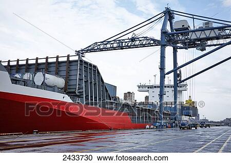 Crane and freight at Bickerdike Pier in Old Montreal; Montreal, Quebec, Canada View Large Photo Image Stock Image - Crane and freight at Bickerdike Pier in Old Montreal; Montreal, Quebec, Canada. Fotosearch
