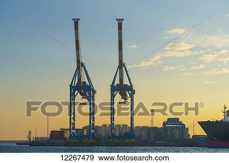 Stock Photo - Cranes in the harbour; Genoa, Liguria, Italy. Fotosearch