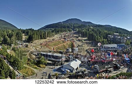 Stock Image - Crankworx offers slopestyle mountain biking and a custom built Boneyard at the base of the Whistler Mountain Bike Park; Whistler, British Columbia, Canada. Fotosearch