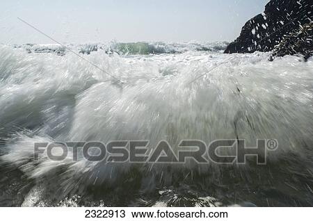 Crashing waves at Coumeenoole; Slea Head, Dingle, County Kerry, Ireland, UK View Large Photo Image Stock Image - Crashing waves at Coumeenoole; Slea Head, Dingle, County Kerry, Ireland, UK. Fotosearch