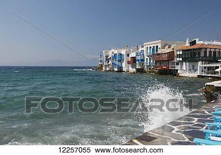 Crashing waves in the Little Venice area; Mykonos Town, Mykonos, The Cyclades, The Greek Islands, Greece View Large Photo Image Stock Photography - Crashing waves in the Little Venice area; Mykonos Town, Mykonos, The Cyclades, The Greek Islands, Greece. Fotosearch