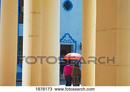 Stock Image - Cream And Blue Buildings In Bayamo.. Fotosearch