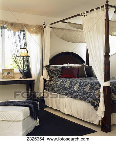 Cream-colored bedroom with four-poster bed; Victoria vancouver island british columbia View Large Photo Image Picture - Cream-colored bedroom with four-poster bed; Victoria vancouver island british columbia. Fotosearch