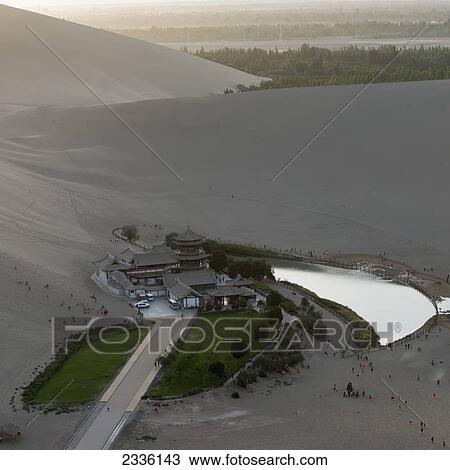 Crescent Moon Spring And Mingsha Mountain; Jiuquan, Gansu, China View Large Photo Image Stock Image - Crescent Moon Spring And Mingsha Mountain; Jiuquan, Gansu, China. Fotosearch