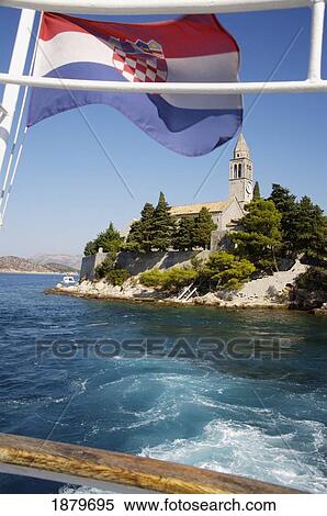 Croatian Flag Waving In Wind With Church In Distance View Large Photo Image Stock Photography - Croatian Flag Waving In Wind With Church In Distance. Fotosearch