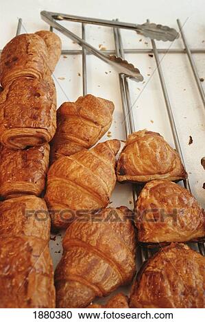 Stock Image - Croissants In A Patisserie In Paris, Close-Up. Fotosearch