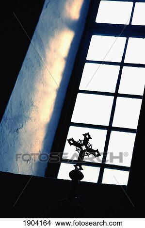 Picture - Cross Against Monastery Window, Low Angle View, Lopud, Croatia. Fotosearch