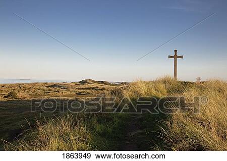 Stock Photo - Cross On A Hill Overlooking Valley, Alnmouth, Northumberland, England. Fotosearch