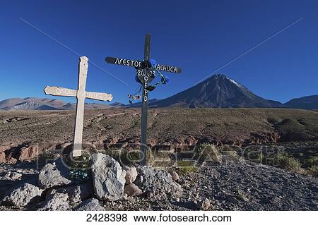 Crosses at a roadside and Licancabur Volcano in the distance; Chile View Large Photo Image Stock Photo - Crosses at a roadside and Licancabur Volcano in the distance; Chile. Fotosearch