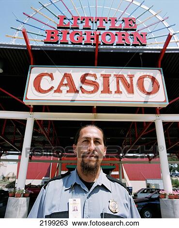 Crow Indian Working As Security Guard For The Little Bighorn Casino In The Crow Reservation. The Crow (Apsaaloke, Apsaroke Or Absaroke) Live In The Crow Reservation (Montana, Usa). View Large Photo Image Stock Image - Crow Indian Working As Security Guard For The Little Bighorn Casino In The Crow Reservation. The Crow (Apsaaloke, Apsaroke Or Absaroke) Live In The Crow Reservation (Montana, Usa).. Fotosearch