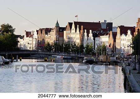 Crow-Stepped Gabled Houses Along The Hansahafen, Lubeck, Germany View Large Photo Image Stock Photo - Crow-Stepped Gabled Houses Along The Hansahafen, Lubeck, Germany. Fotosearch