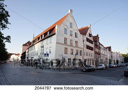 Stock Photo - Crow-Stepped Gabled Houses Along The Hansahafen, Lubeck, Germany. Fotosearch