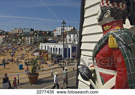 Crowd on the beach and pedestrians on the promenade; Broadstairs, Kent, England View Large Photo Image Stock Photography - Crowd on the beach and pedestrians on the promenade; Broadstairs, Kent, England. Fotosearch