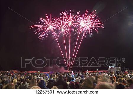 Crowd watching fireworks display; South Shields, Tyne and Wear, England View Large Photo Image Stock Image - Crowd watching fireworks display; South Shields, Tyne and Wear, England. Fotosearch