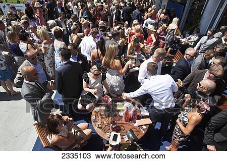 Crowded Bar At Epsom Derby On Lady's Day; London, England, Uk View Large Photo Image Stock Image - Crowded Bar At Epsom Derby On Lady's Day; London, England, Uk. Fotosearch