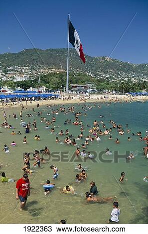 Crowded Beach Scene And Mexican Flag View Large Photo Image Stock Image - Crowded Beach Scene And Mexican Flag. Fotosearch