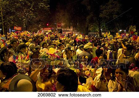 Crowds At The Gran Entrada De Comadres Parade During The Carnaval Chapaco At Night, Tarija, Bolivia View Large Photo Image Stock Image - Crowds At The Gran Entrada De Comadres Parade During The Carnaval Chapaco At Night, Tarija, Bolivia. Fotosearch