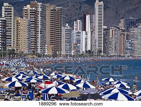 Stock Photograph - Crowds Of People On Benidorm Beach. Fotosearch