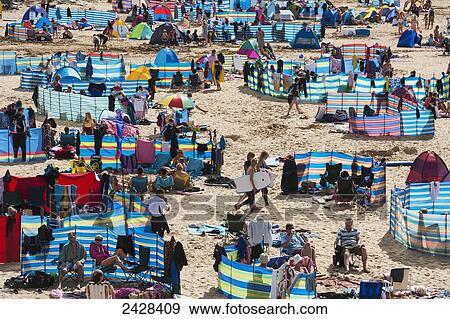Crowds on Treyarnon Bay beach; Cornwall, England View Large Photo Image Stock Photo - Crowds on Treyarnon Bay beach; Cornwall, England. Fotosearch