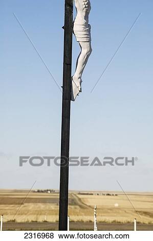 Stock Photo - Crucifix In Catholic Cemetery; Saskatchewan Canada. Fotosearch