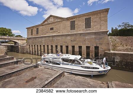 Stock Image - Cruise boat on the Canal du Midi; France. Fotosearch