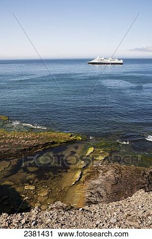 Stock Image - Cruise ship in the arctic ocean; Svalbard, Norway. Fotosearch