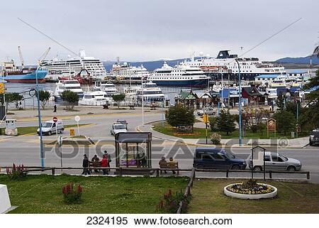 Cruise ships docked in harbor by tour offices and tour boats; Ushuaia, Tierra del Fuego, Argentina View Large Photo Image Stock Photography - Cruise ships docked in harbor by tour offices and tour boats; Ushuaia, Tierra del Fuego, Argentina. Fotosearch