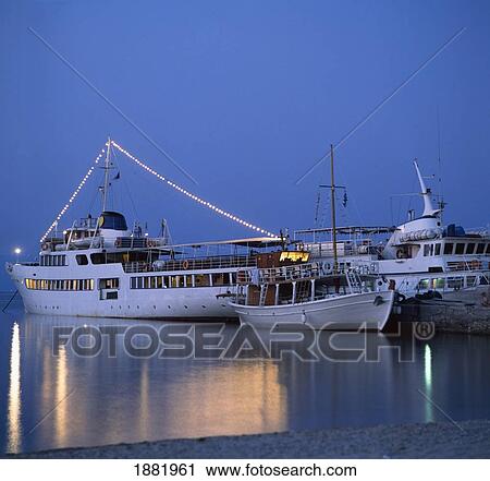 Stock Image - Cruise Ships Moored In Halkidiki Harbor. Fotosearch