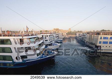 Stock Photo - Cruise Ships On The Nile River Between Aswan And Edfu, Egypt. Fotosearch