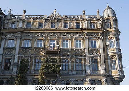 Crumbling facade ornately decorated neoclassical apartment building in the historical city centre; Odessa, Ukraine View Large Photo Image Stock Photograph - Crumbling facade ornately decorated neoclassical apartment building in the historical city centre; Odessa, Ukraine. Fotosearch