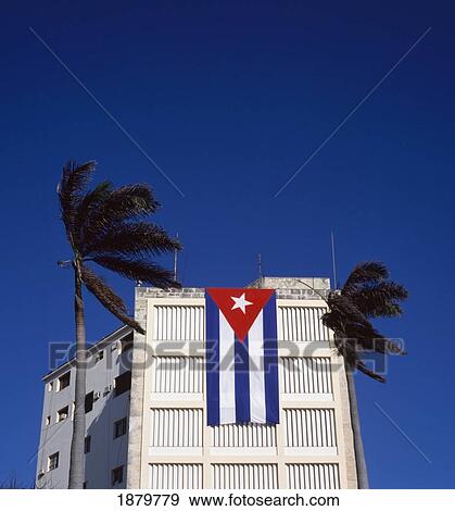 Stock Photo - Cuban Flag Hanging On Building. Fotosearch