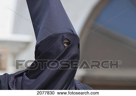Stock Image - Cucurucha (Penitent) At The Holy Burial Procession On Good Friday In Antigua Guatemala, Sacatep. Fotosearch