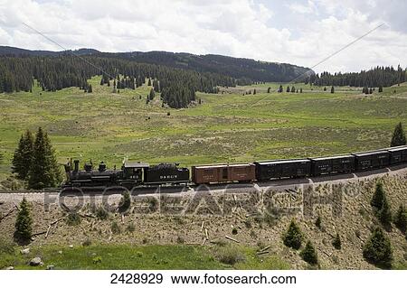 Stock Photo - Cumbres and Toltec Scenic Railroad with steam powered locomotive; New Mexico. Fotosearch