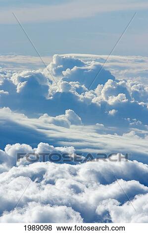 Cumulus Clouds In Blue Skies View Large Photo Image Stock Photo - Cumulus Clouds In Blue Skies. Fotosearch