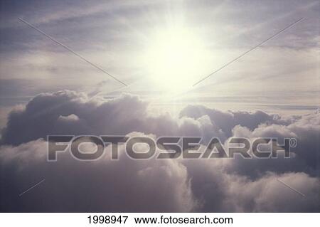 Cumulus Clouds View From Above, Sunburst In Sky B1451 View Large Photo Image Stock Photo - Cumulus Clouds View From Above, Sunburst In Sky B1451. Fotosearch