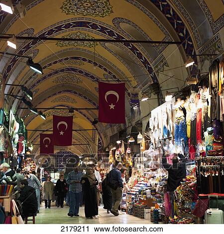 Stock Image - Customers In The Grand Bazaar; Istanbul Turkey. Fotosearch