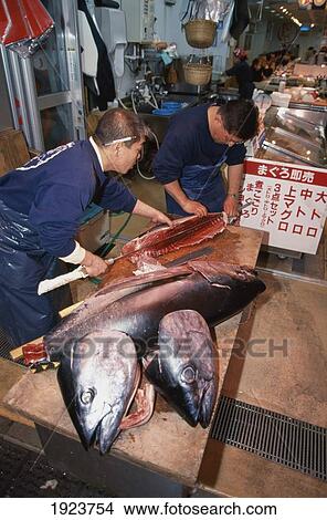 Cutting Up Tuna At A Sushi Restaurant View Large Photo Image Picture - Cutting Up Tuna At A Sushi Restaurant. Fotosearch