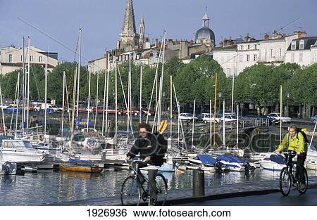Cycling Along Harbour Front Charente-Mar View Large Photo Image Stock Photograph - Cycling Along Harbour Front Charente-Mar. Fotosearch