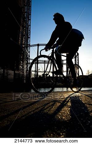 Stock Image - Cycling Around Regents Canal In Shoreditch, East London, London, Uk. Fotosearch