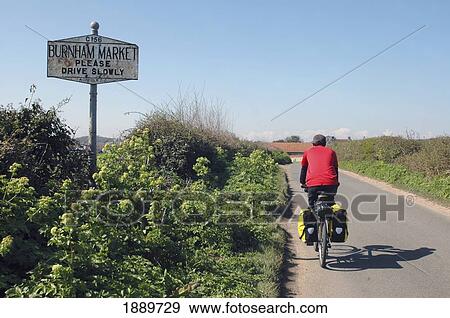 Cyclist On Rural Road, Rear View View Large Photo Image Stock Photo - Cyclist On Rural Road, Rear View. Fotosearch